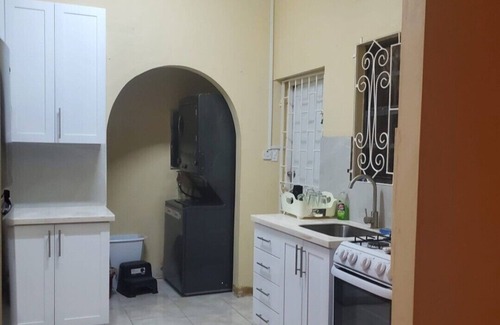 Sunset Crest House | Charming 2-bedroom bungalow in beautiful Holetown with WiFi, AC, & pool access!
