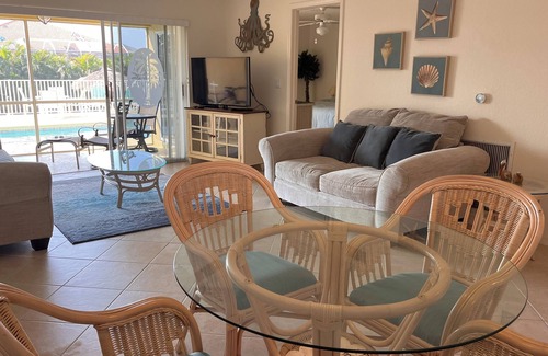 Pelican Condo | Charming 2-bedroom condo with WiFi, in Cape Coral with pool, spa, & water view.