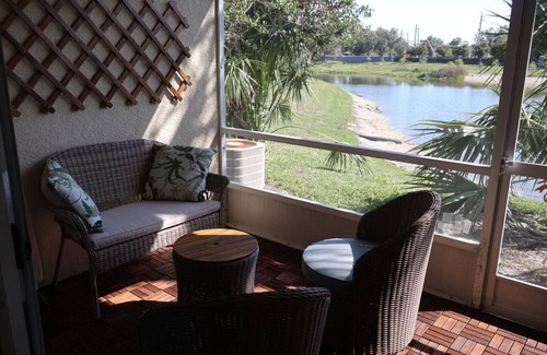 Sabal Harbour House | Charming 2-bedroom townhome with water view and resort style pool