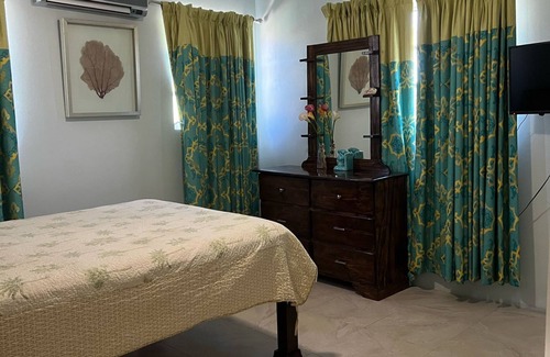 Belair Estates House | Charming 2-bedroom townhome in Nassau with WiFi, AC. Relax and unwind