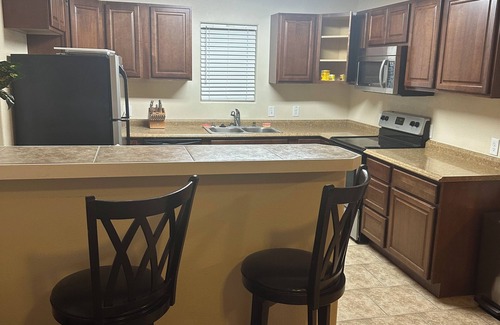 Casper House | Charming 2-bedroom townhome centrally located in lovely Casper with AC
