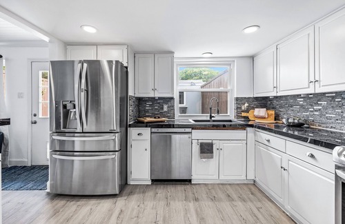 Park Central House | Charming 2-bedroom townhome, private pool and two car garage in Dallas