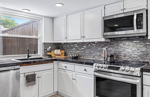 Park Central House | Charming 2-bedroom townhome, private pool and two car garage in Dallas