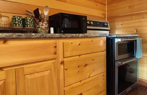 Island Falls Apartment | Charming 2-bedroom apartment above garage in Island Falls.