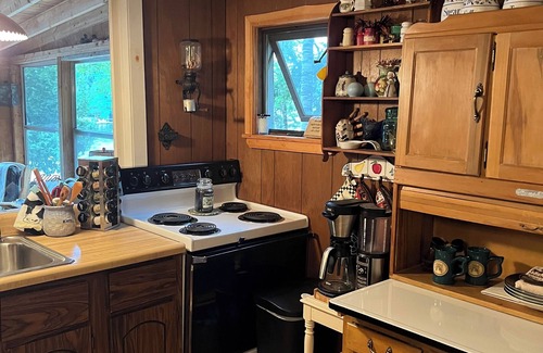 Saranac Lake Cabin | Charming 2-bedroom cabin on the water! Featuring boathouse and dock Saranac Lake