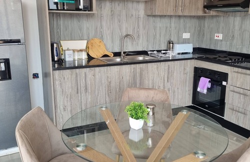 Lusaka Apartment | Charming 2Beds-3Baths Apt with WiFi and backup solar in Ibex Kingsland Lusaka 1