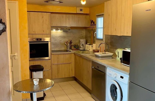 Quartier du Stade House | Charming 2BR House with Pool, Balcony, WiFi, and Private Garden Near Beach