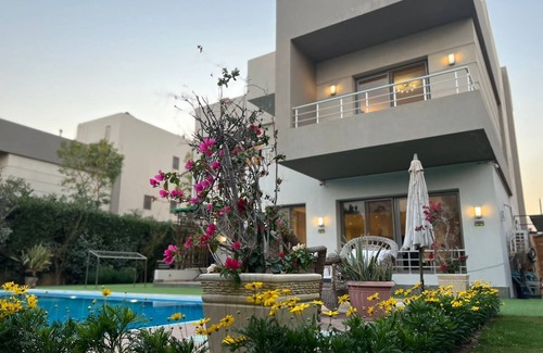 Sheikh Zayed City Villa | Charming 3-bedroom villa with AC, WiFi in tranquil Giza Governorate