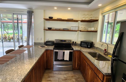 Carara Villa | Charming 3-bedroom River edge villa with WiFi and AC minutes from Playa Hermosa