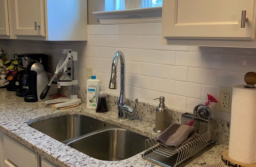 Uptown House | Charming 3 Bedroom/2Bathroom Uptown Cottage with off-street Parking.