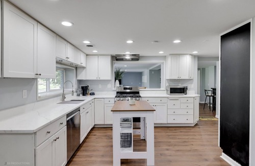La Porte House | Charming 3-bedroom coastal, central, cozy house across from Pine Lake