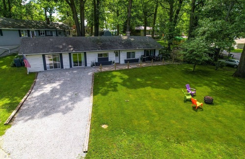 La Porte House | Charming 3-bedroom coastal, central, cozy house across from Pine Lake