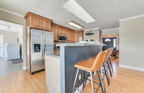 Cheboygan House | Charming 3-bedroom home on the Cheboygan River w/Boat Dock and Kayaks