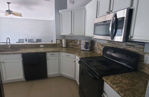 Crescent Lakes House | Charming 3-bedroom house with WiFi, AC, Pool, Lake View, by Disney.