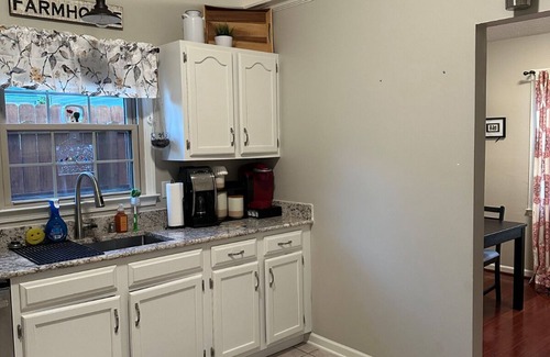 Lexington House | Charming 3-bedroom house with premier back yard space and koi pond