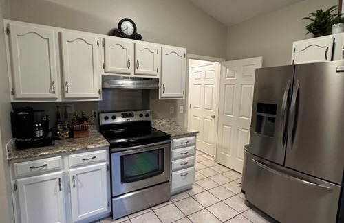 Lexington House | Charming 3-bedroom house with premier back yard space and koi pond