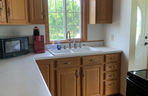 Britton House | Charming 3-bedroom home with AC, WiFi in Britton. Quiet, trees, and sunsets!