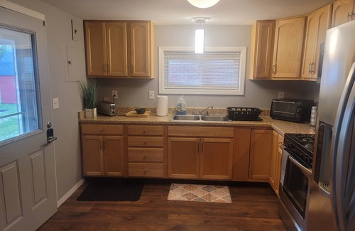 Xenia House | Charming 3-bedroom home, w/Basement Covered back porch AC, WiFi