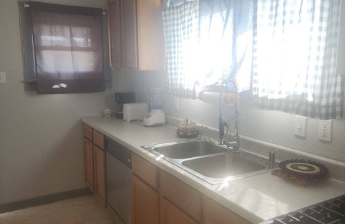 Pueblo House | Charming 3-bedroom house. Great basecamp for work or play.