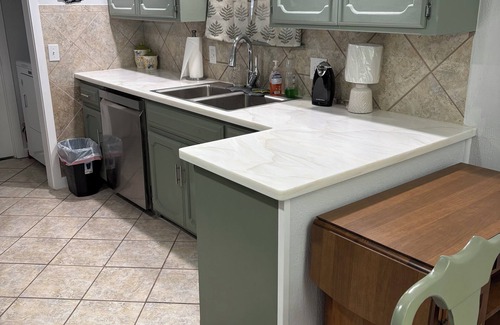 Enid House | Charming 3-bedroom house with heating/AC, family friendly and centrally located.