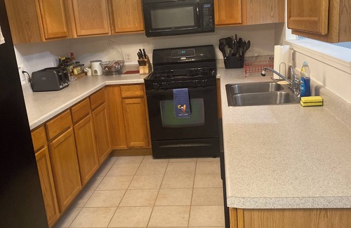 DeKalb House | Charming 3-bedroom townhome in delightful DeKalb with WiFi, AC
