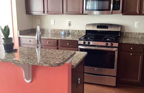 Laurel House | Charming 3-bedroom townhome with WiFi, AC, & Community pool in serene Laurel, Md