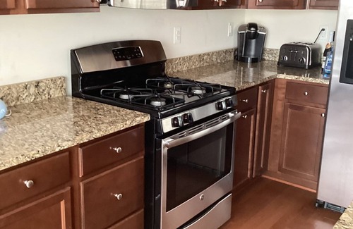 Laurel House | Charming 3-bedroom townhome with WiFi, AC, & Community pool in serene Laurel, Md