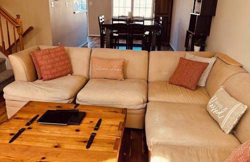 Laurel House | Charming 3-bedroom townhome with WiFi Parking and AC in Laurel