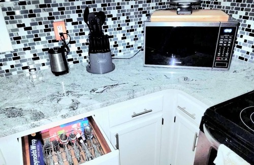 Westover House | "Charming 3-Bedroom Home with Private Gym in Prime Neighborhood!"