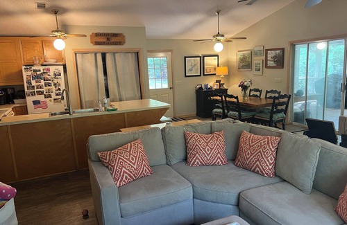 Gainesville Cabin | Charming 3-bedroom family cabin on the lake with dock, screened porch, & wi-fi!n