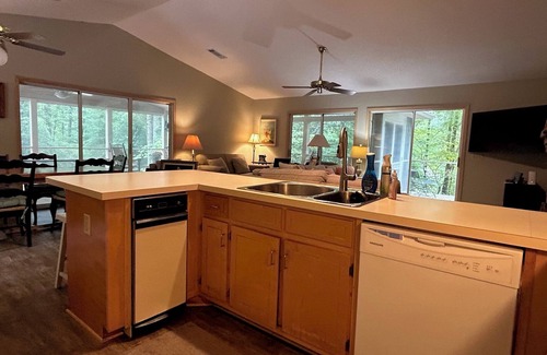 Gainesville Cabin | Charming 3-bedroom family cabin on the lake with dock, screened porch, & wi-fi!n
