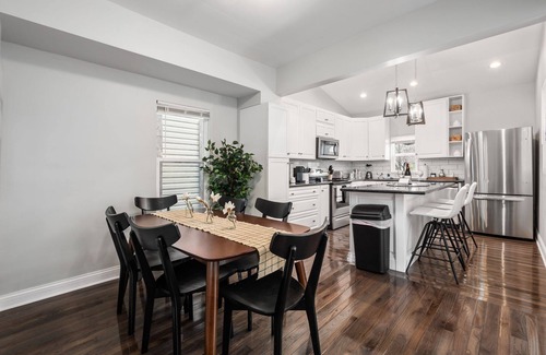 West Columbus House | Charming 4-bedroom home with a pool table, spacious living, & modern kitchen.