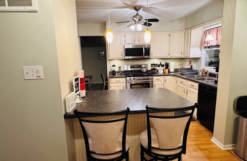 Dover House | Charming 4-bedroom house with pool and spacious backyard.