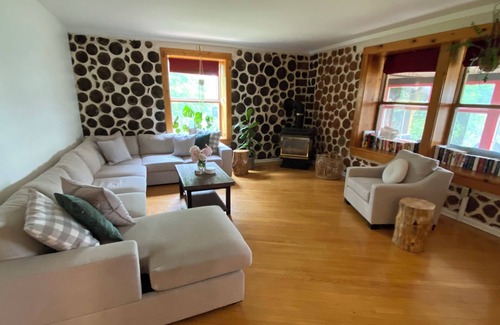 Whitewater Region Cottage | Charming 4 Season Log Lake House w/ Hot Tub located in the Whitewater Region