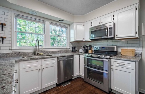 Duluth House | Charming 4BR/3BA Home|Pets Welcome|Large Yard & 2-Car Garage Oasis #41646