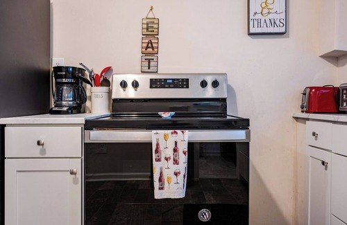 Cary House | Charming 4BR Cape Cod Near Downtown Cary and Parks