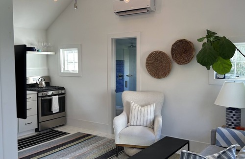 East Quogue Cottage | Charming and Bright Cottage with Salt Water Pool