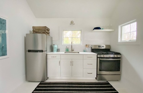 East Quogue Cottage | Charming and Bright Cottage with Salt Water Pool
