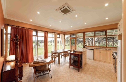 Macgillivray Cottage | Charming and Private Cottage with Fireplace for a Cozy Island Getaway.