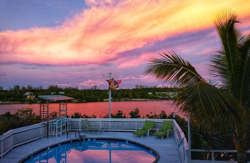 Great Harbour Cay House | Charming and Secluded Home on the Bay with Fresh Water Pool, Dock, Views.