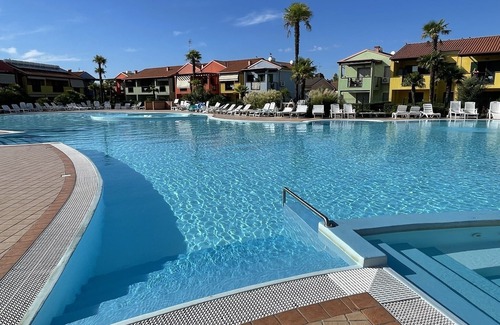 Aprilia Marittima Apartment | Charming apartment with private garden and swimming pool in Aprilia Marittima