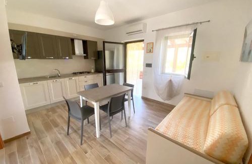 Chiesiola Apartment | Charming Apartment in Vieste with Shared Pool and Garden