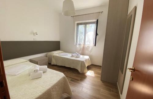 Chiesiola Apartment | Charming Apartment in Vieste with Shared Pool and Garden