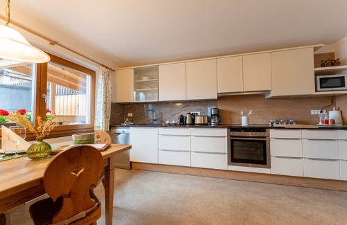 Santa Valburga Apartment | Charming Apartment “Panorama Raffeinhof” with Lake View, Balcony, Terrace & Garden