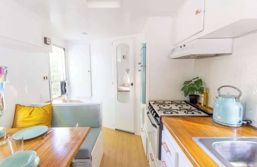 Miller Lake House | Charming Blue Glamping RV Close to Grotto