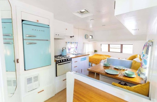 Miller Lake House | Charming Blue Glamping RV Close to Grotto