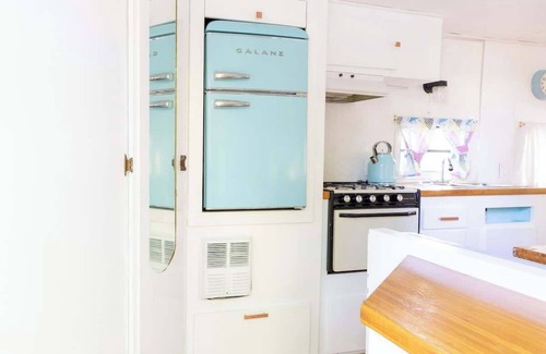 Miller Lake House | Charming Blue Glamping RV Close to Grotto