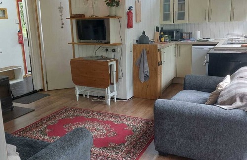 Dallavich Cabin | Charming cabin, in peaceful, woodland location by babbling burn.