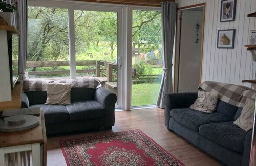 Dallavich Cabin | Charming cabin, in peaceful, woodland location by babbling burn.