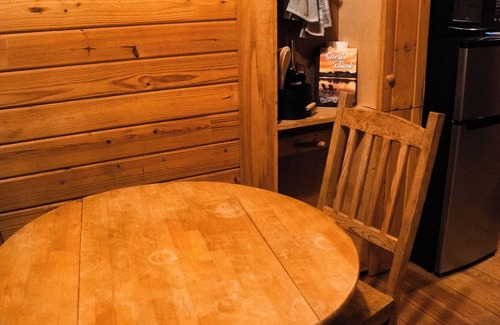 Hattieville Cabin | Charming cabin with loft, porch swing, AC, and WiFi on 295-acre peaceful retreat